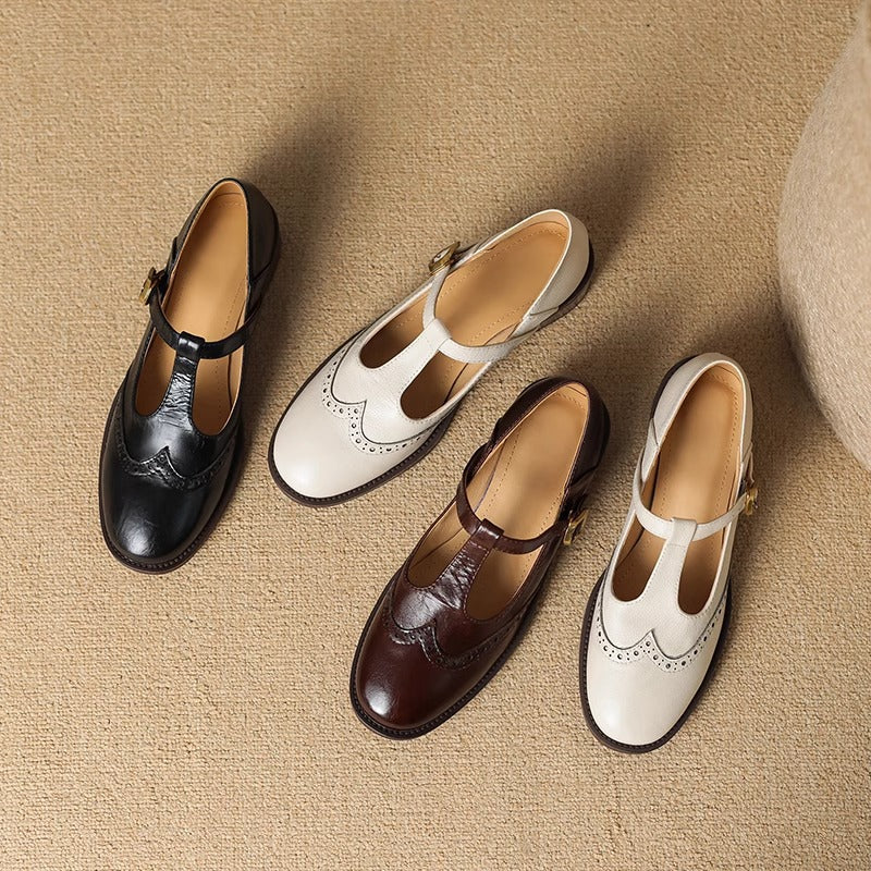 Assorted Mary Jane shoes in black, off-white, and dark brown, each with buckle strap