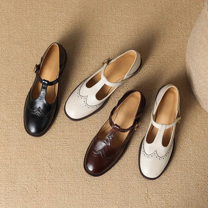Assorted Mary Jane shoes in black, off-white, and dark brown, each with buckle strap
