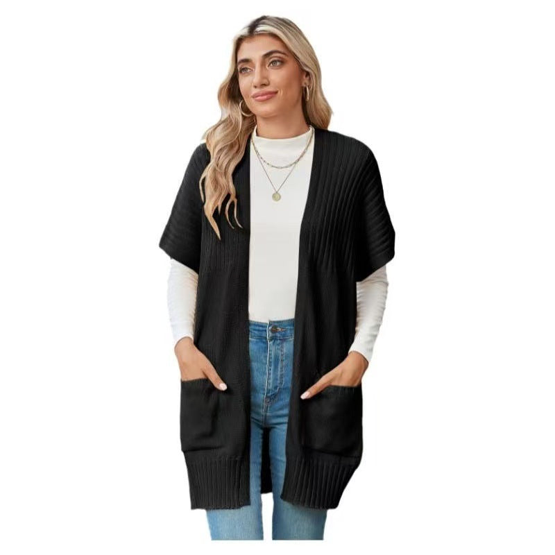 Lightweight open-front knit cardigan in black with patch pockets and ribbed hem