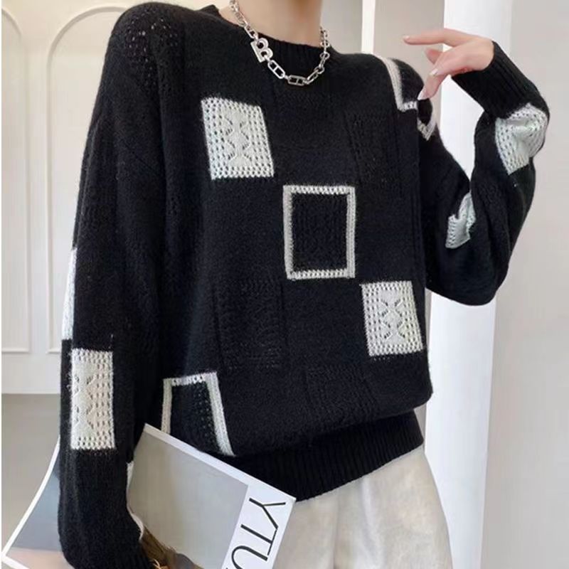 Elegant knit sweater, black with white square patches, ribbed hem and cuffs, crewneck