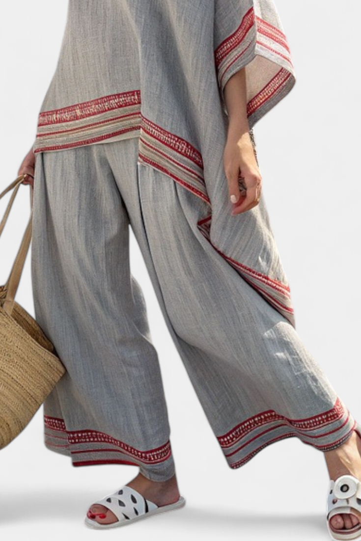 Gray wide-leg trousers with red striped hem and side panel trim