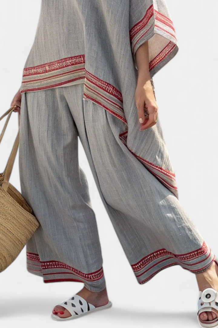 Gray wide-leg trousers with red striped hem and side panel trim