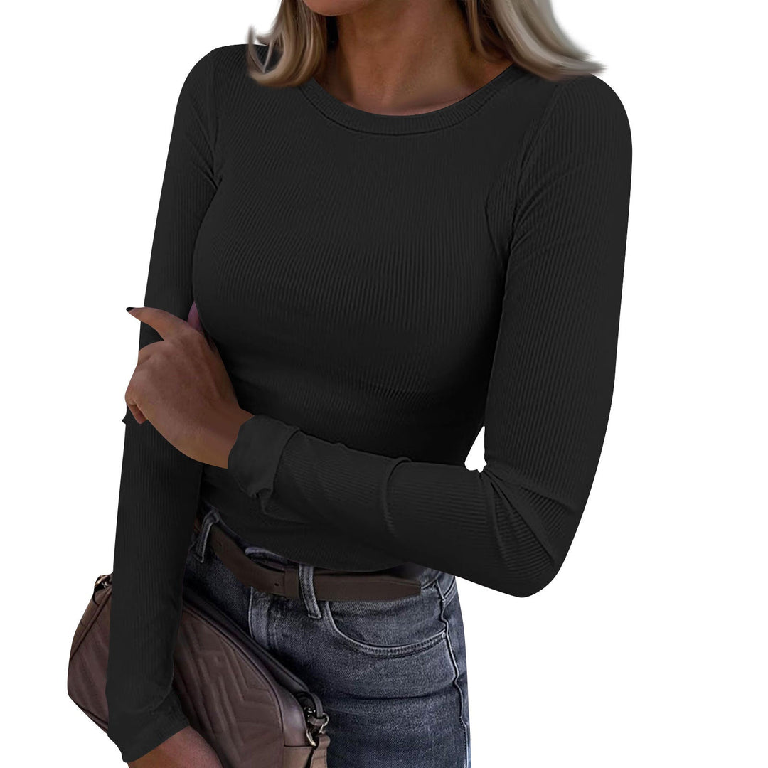 Casual crewneck ribbed long-sleeve top in black, fitted fit, stretchy knit texture.
