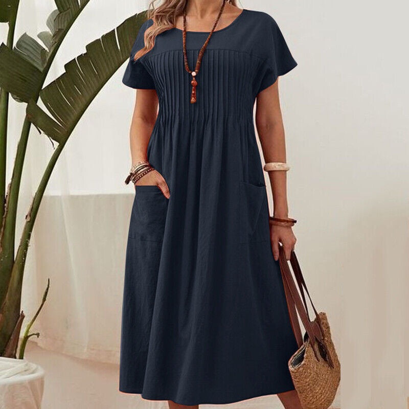 Navy midi dress with short sleeves, pleated yoke and gathered skirt