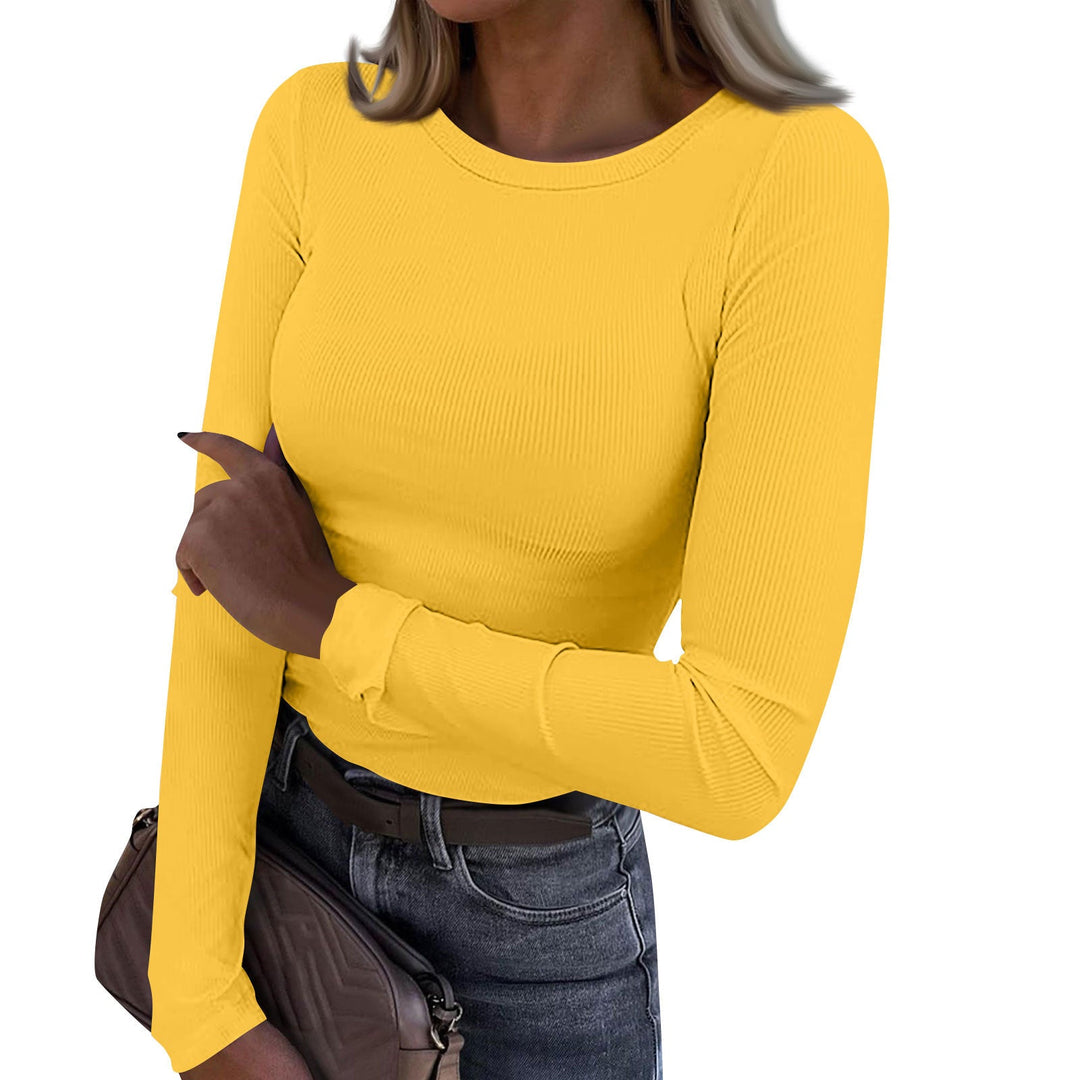 Casual crewneck ribbed long-sleeve top in yellow, fitted fit, stretchy knit texture.