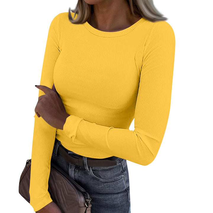 Casual crewneck ribbed long-sleeve top in yellow, fitted fit, stretchy knit texture.