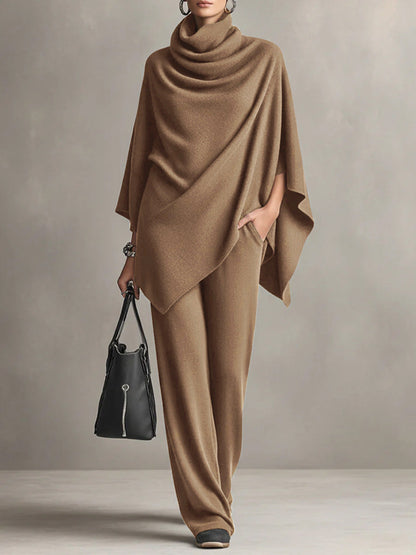 Brown draped cowl-neck cape top with asymmetrical hem and wide-leg trousers