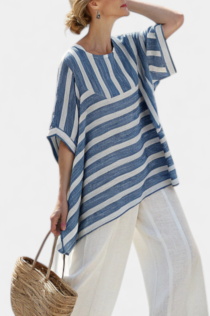 Blue-and-white striped top with wide sleeves and split hem, with white trousers