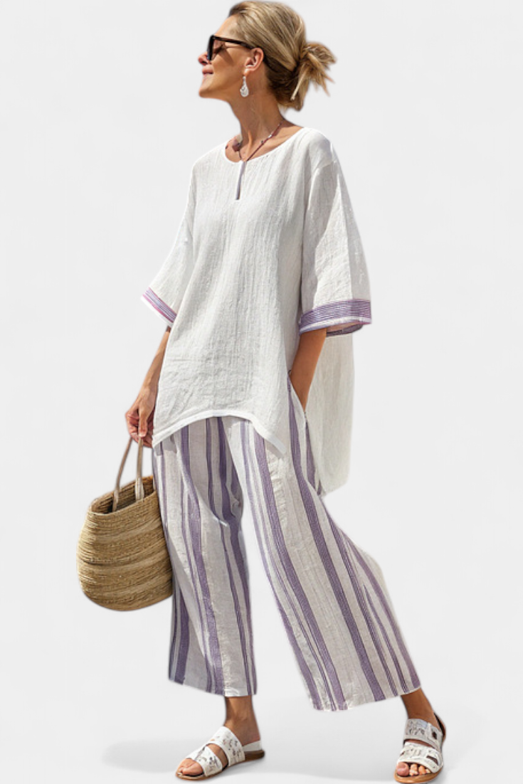 Relaxed shirt and striped trousers set: white tunic with purple trim, wide-leg striped pants