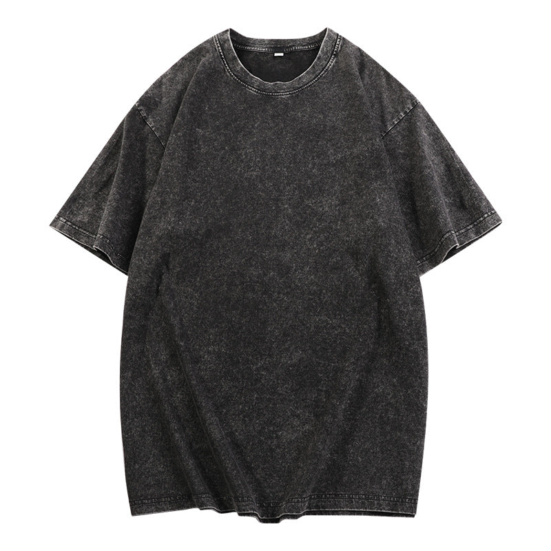 Black loose-fit crewneck top with short sleeves and ribbed neckline