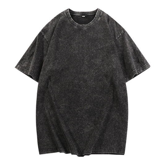 Black loose-fit crewneck top with short sleeves and ribbed neckline