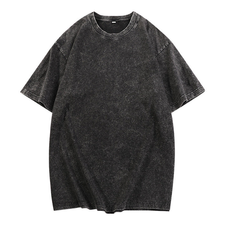 Black loose-fit crewneck top with short sleeves and ribbed neckline