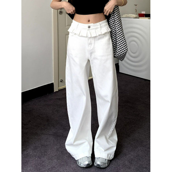 White wide-leg jeans with lace-trimmed ruffled waistband and button-front closure