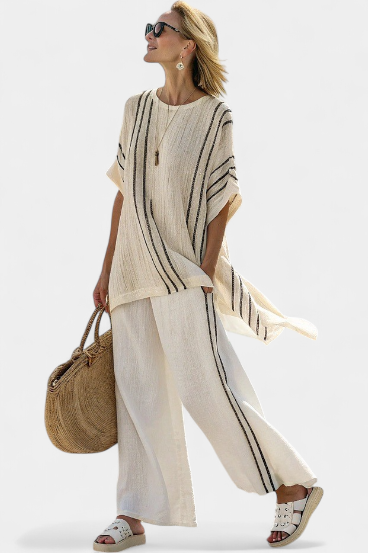 Ivory linen blouse and striped trousers with wide legs, relaxed fit
