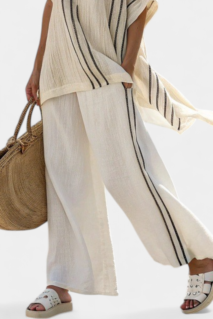 Ivory wide-leg trousers with vertical black stripe detail