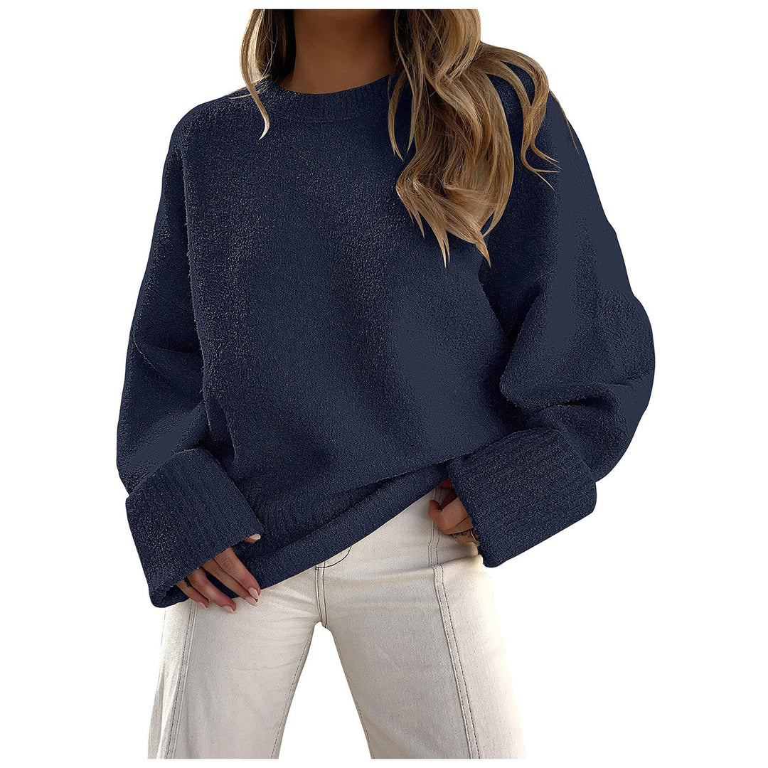 Dark blue fuzzy knit pullover sweater with crew neck and ribbed cuffs, oversized fit