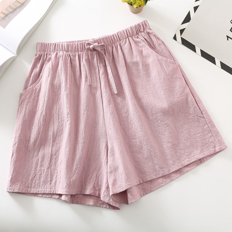 Rose pink relaxed-fit shorts with elastic waistband and drawstring tie
