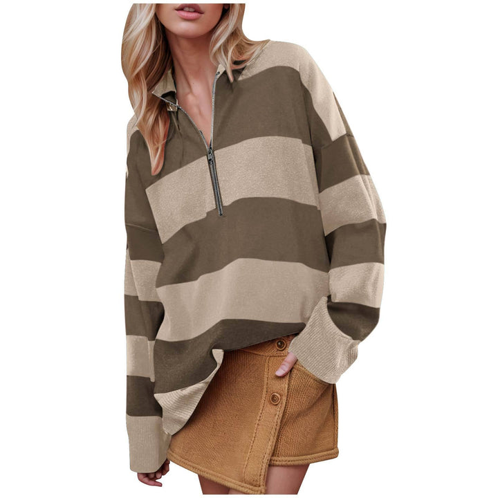 Long-sleeve pullover sweater with half-zip, brown and cream bold stripe pattern.