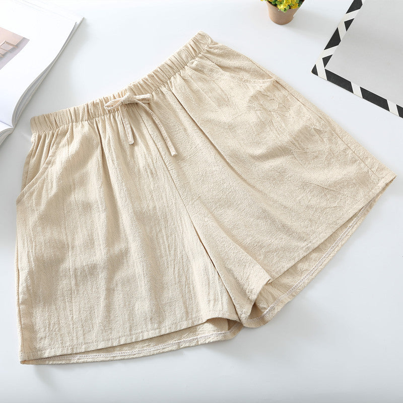 Khaki relaxed-fit shorts with elastic waistband and drawstring tie