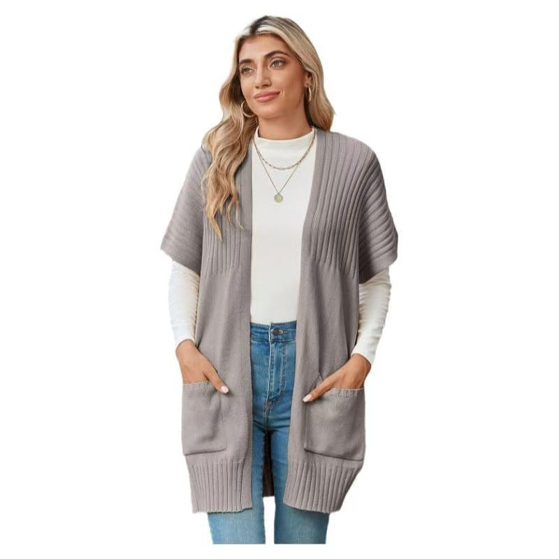 Lightweight open-front knit cardigan in light gray with patch pockets and ribbed cuffs