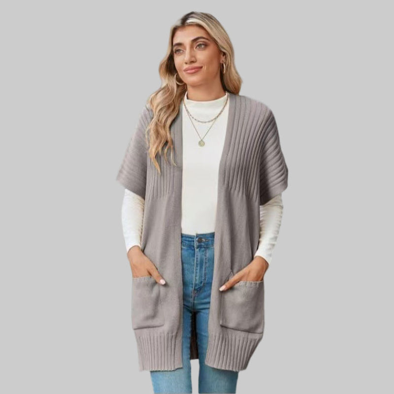 Light gray open-front knit cardigan with patch pockets and ribbed cuffs