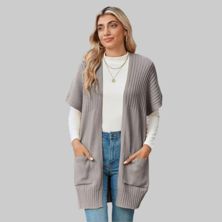 Light gray open-front knit cardigan with patch pockets and ribbed cuffs