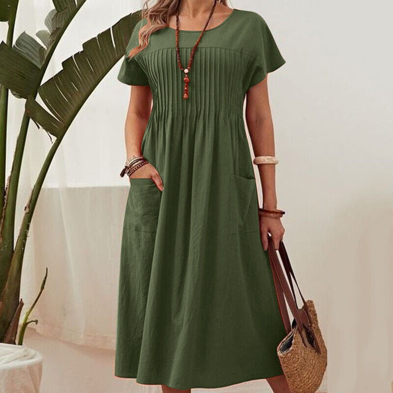 Green midi dress with short sleeves, pleated yoke and gathered skirt