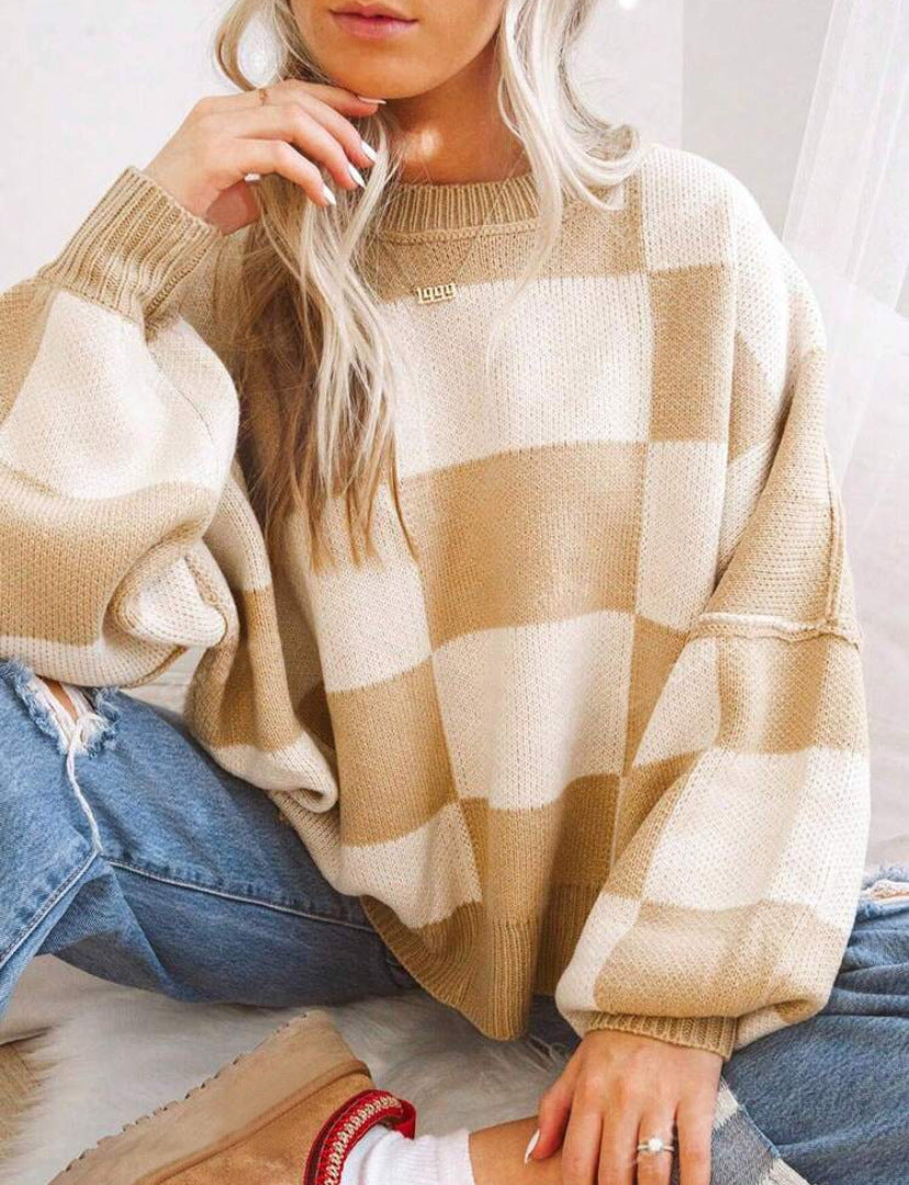 PILDA™ sweater in beige-and-white check, crew neck, loose long sleeves.
