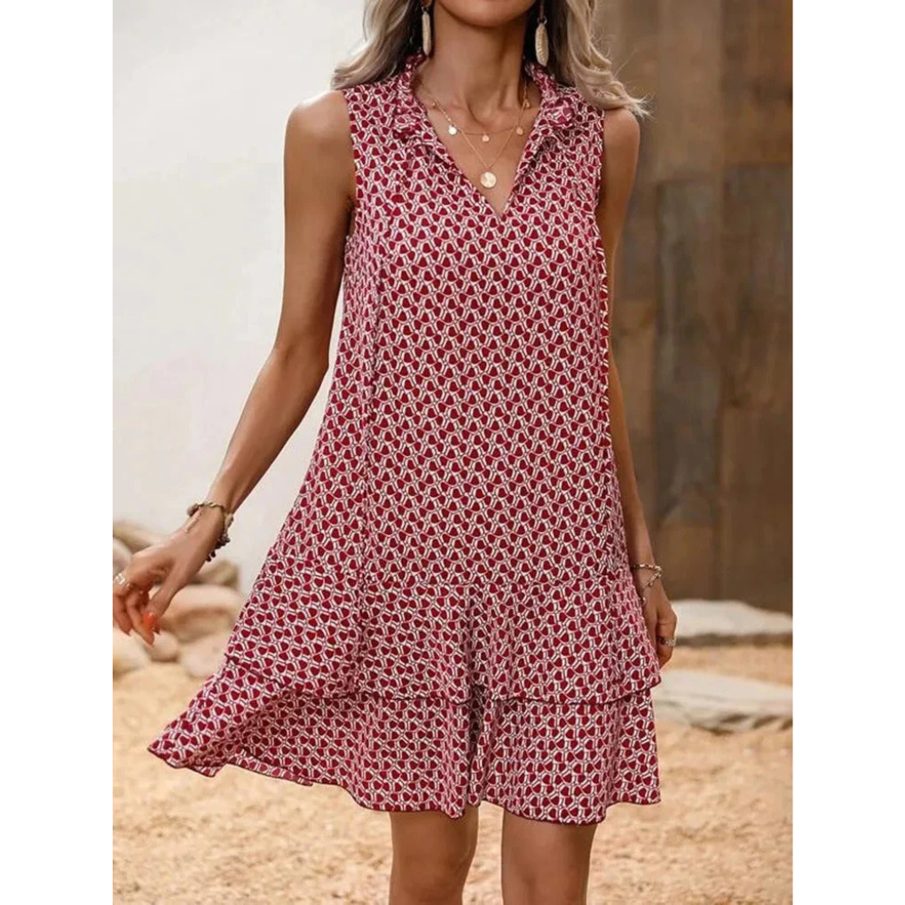 Red patterned sleeveless dress with keyhole neckline and layered A-line skirt
