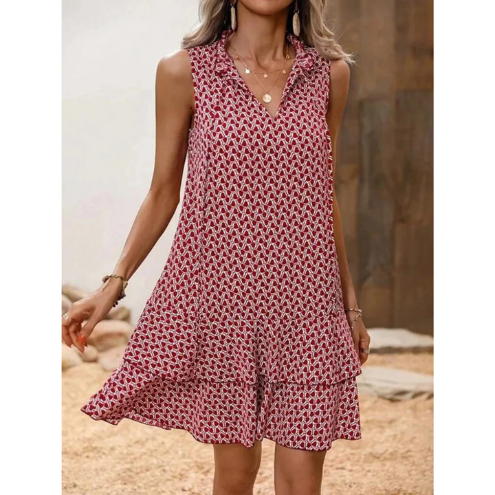 Red patterned sleeveless dress with keyhole neckline and layered A-line skirt