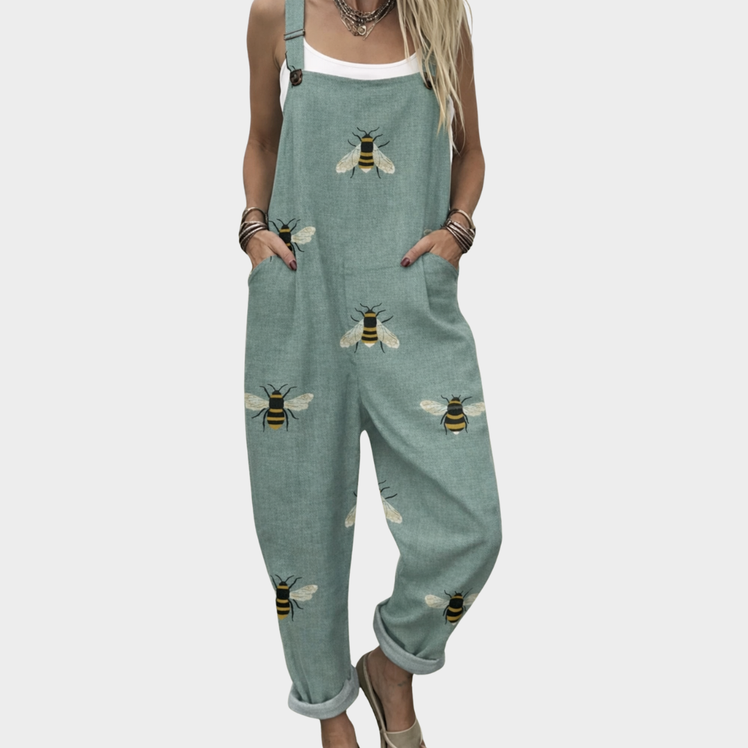 Green bee-printed overalls with wide straps and front bib