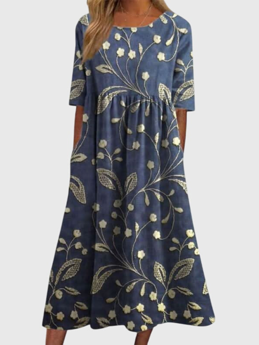 Relaxed midi dress in navy blue with floral and leaf print, short sleeves, gathered skirt