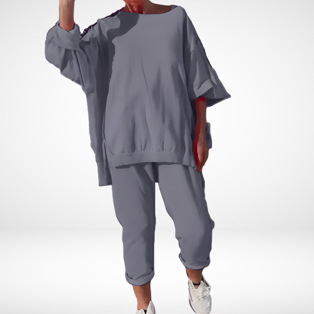 Grey lounge set: loose batwing-style top and cropped jogger pants with elastic cuffs