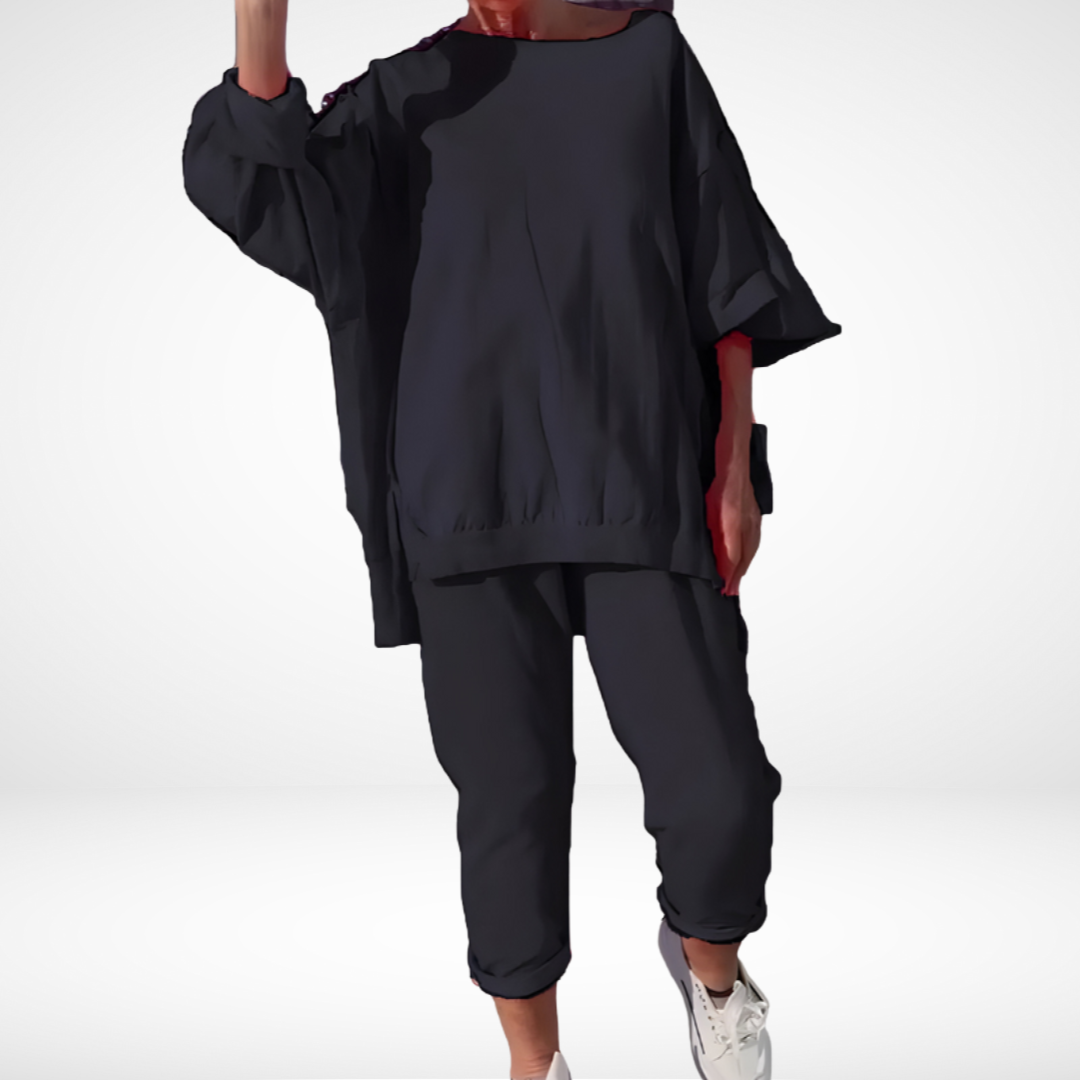 Black lounge set: loose oversized top and cropped jogger pants with elastic cuffs