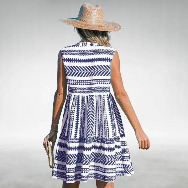 Blue sleeveless V-neck tiered dress, geometric stripe print (back view)