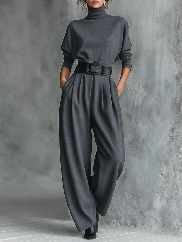 Grey fitted turtleneck top and straight-leg trousers set with wide belt