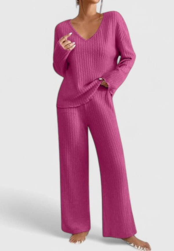 Pink ribbed v-neck sweater and wide-leg pants set with straight, flared legs.