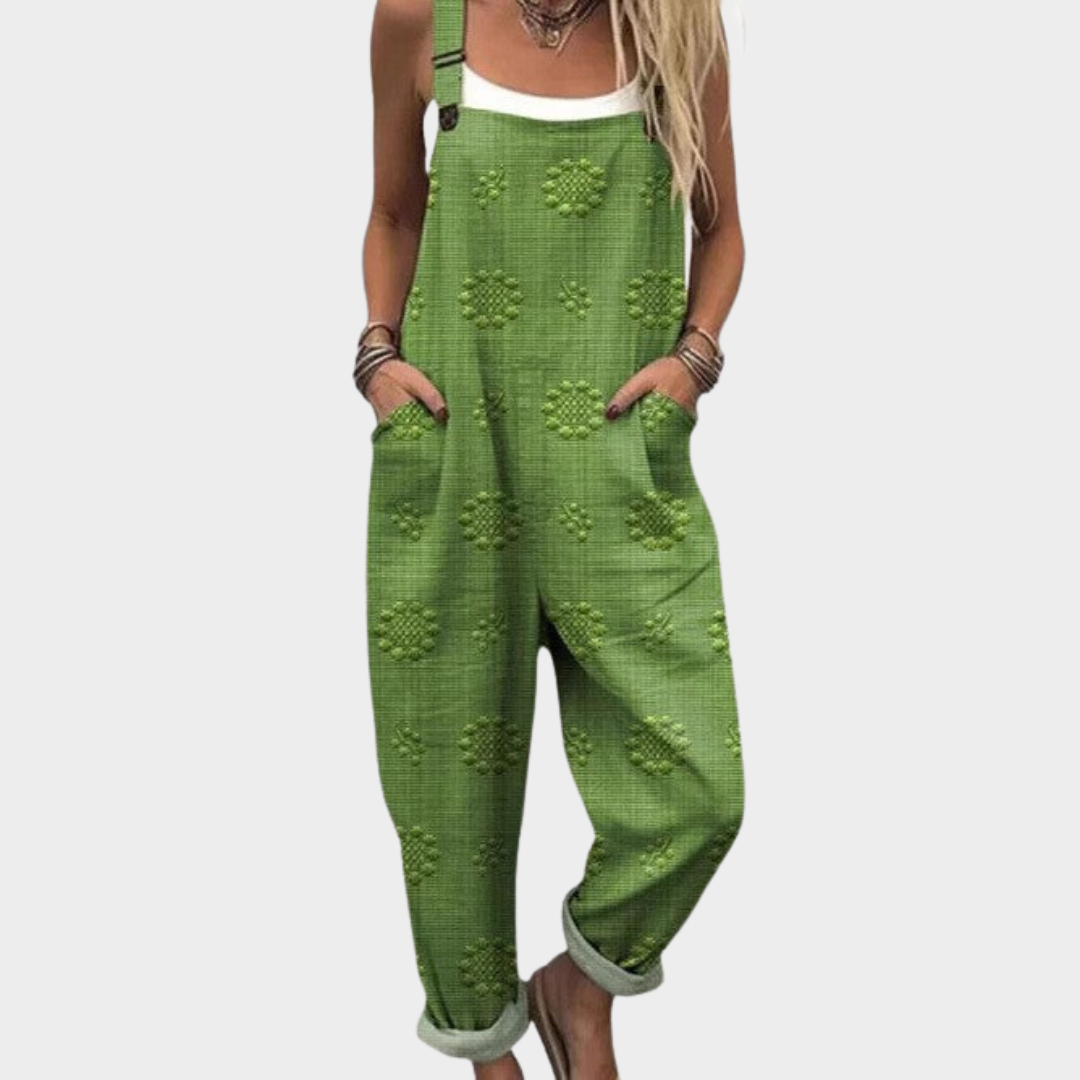 Green printed overalls with adjustable straps and relaxed wide-leg fit