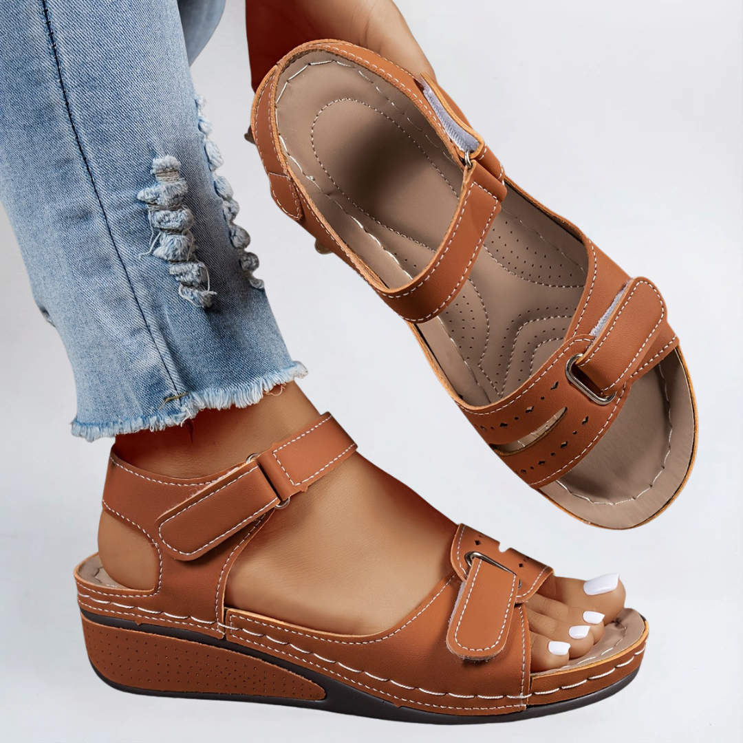 Brown comfort flex orthopedic sandals with two straps and buckled closure