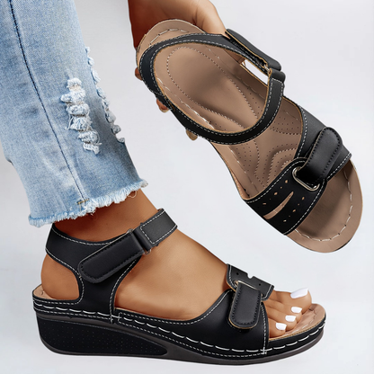 Black comfort flex orthopedic sandals with two straps and adjustable buckle closure