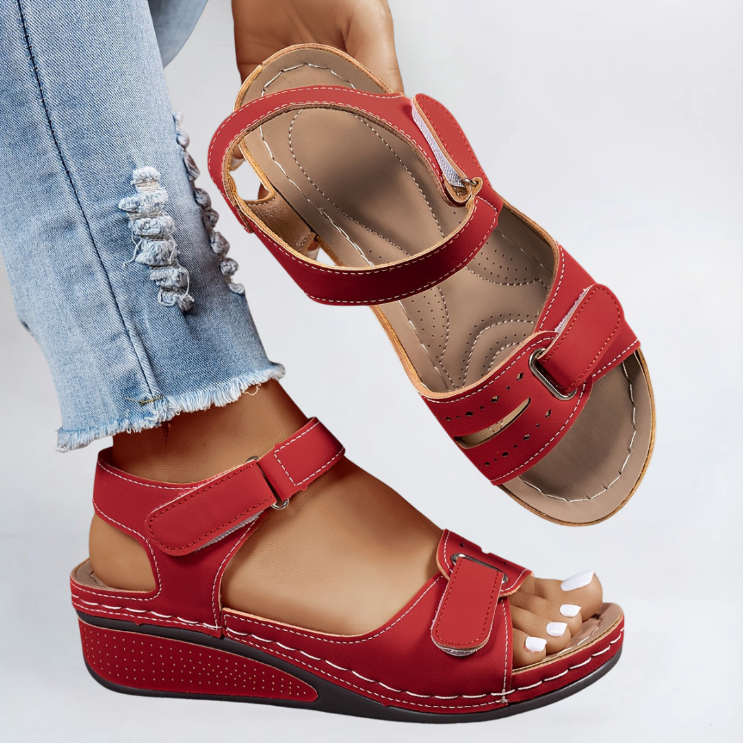 Red comfort flex orthopedic sandals with two straps and buckled closure