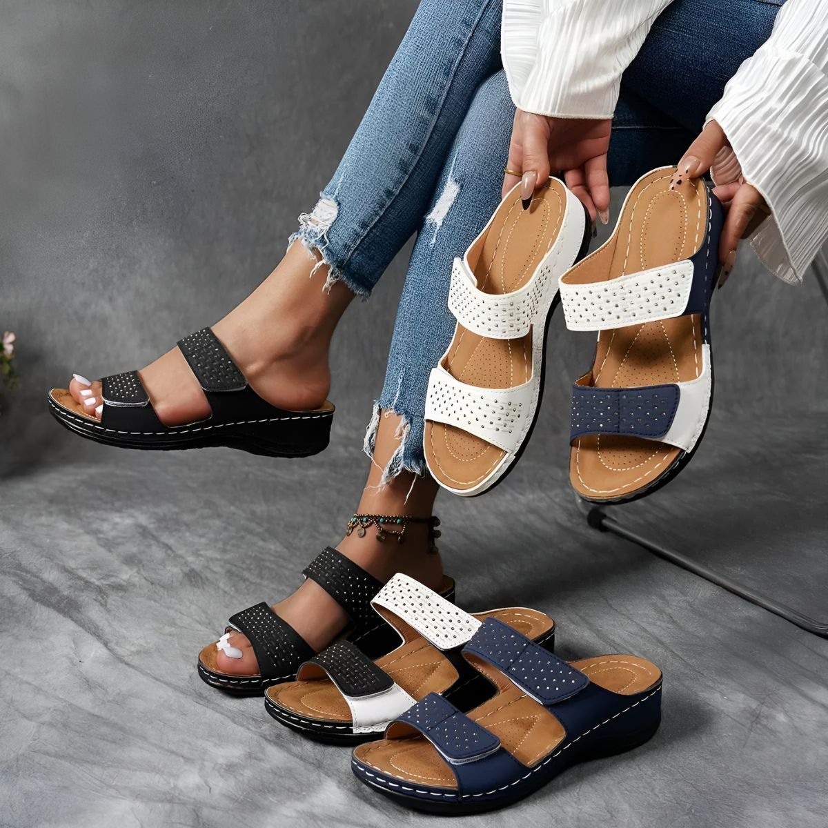 Orthopedic sandals with hook-and-loop straps, black, navy, and white color blocks