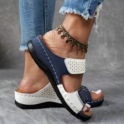 Navy orthopedic sandals with white strap panels and perforated adjustable hook-and-loop
