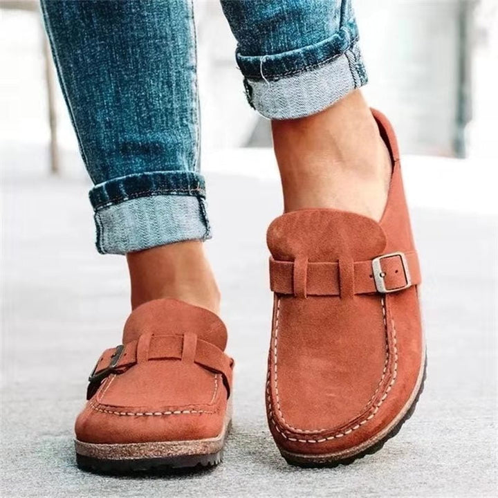 Heidi orthopedic slippers in orange suede with strap and silver buckle detail