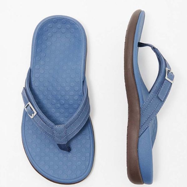 Blue orthopedic sandals: textured footbed view and toe thong with ankle strap.