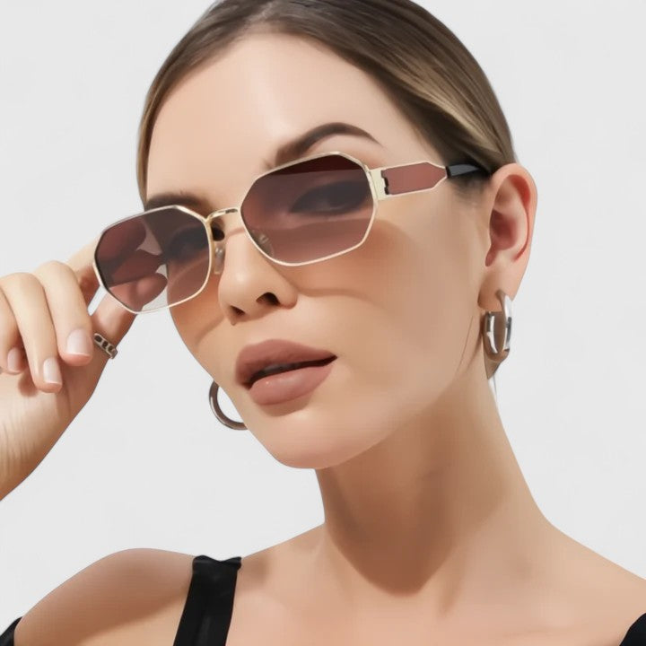 Jaylynne sunglasses on model with rose-tinted lenses and gold-tone frame