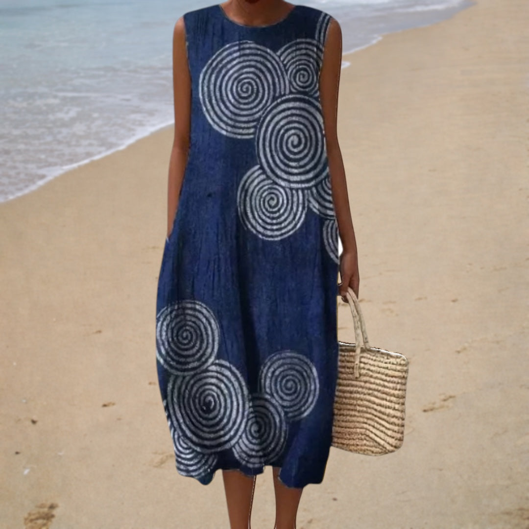 Sleeveless summer dress with round neckline, dark blue and spiral swirl pattern