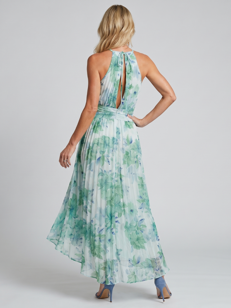 Green halter midi dress with open back and tied neck, pleated floral skirt