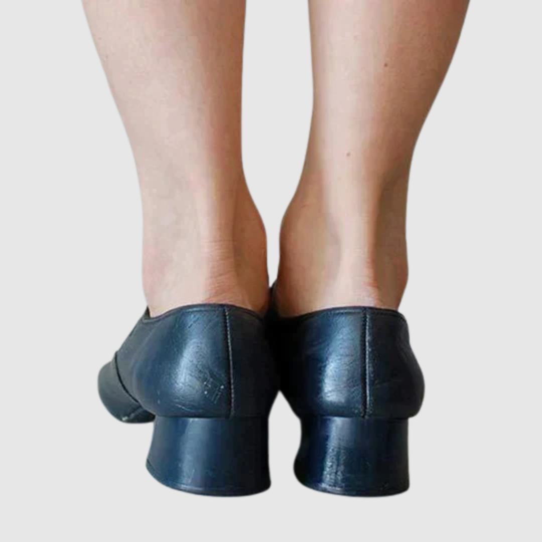 Blue leather Mary Jane flats heel view with stacked block heel and rear seam