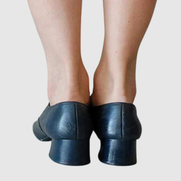 Blue leather Mary Jane flats heel view with stacked block heel and rear seam